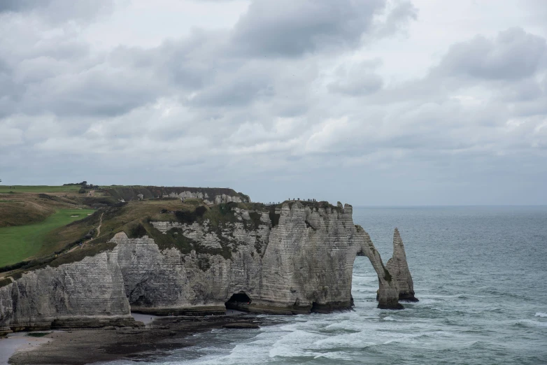 a group of rock formations in the ocean