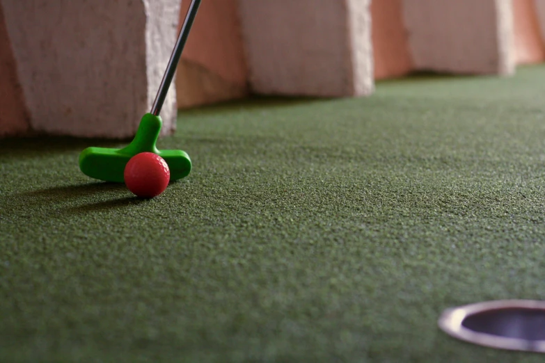 the golf ball is on the course with the tees