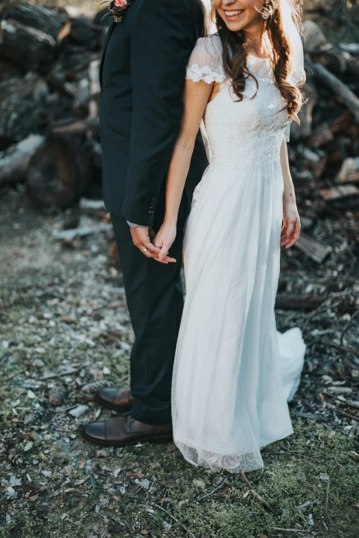 a newly married couple smiling together after their wedding