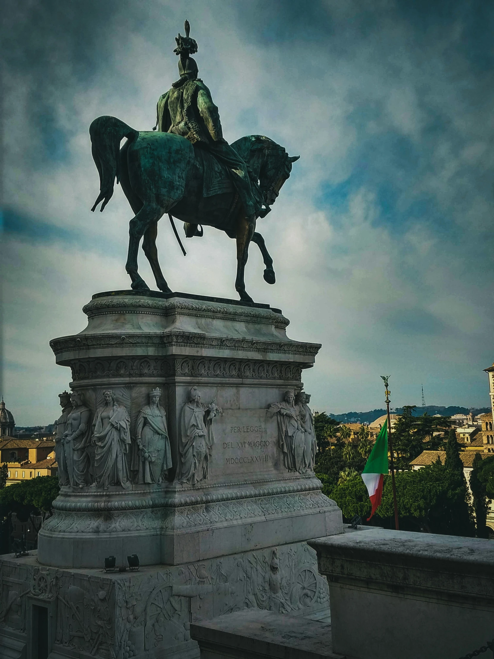 an image of a statue of a man riding a horse