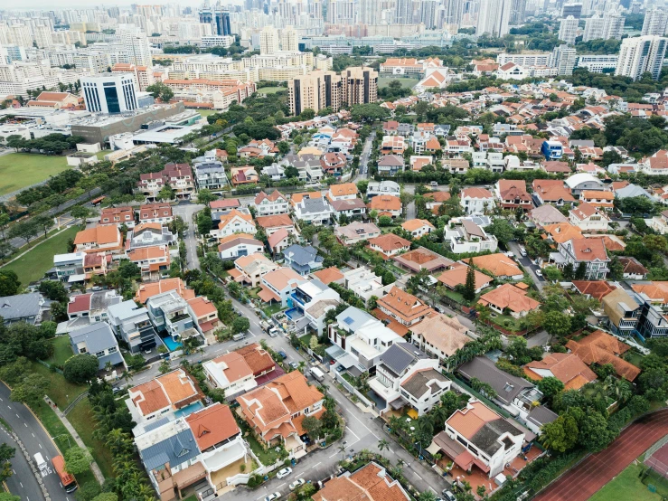 aerial s of residential district in city with city skyscrs in background