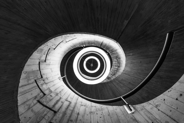 a view from below of a spiral staircase