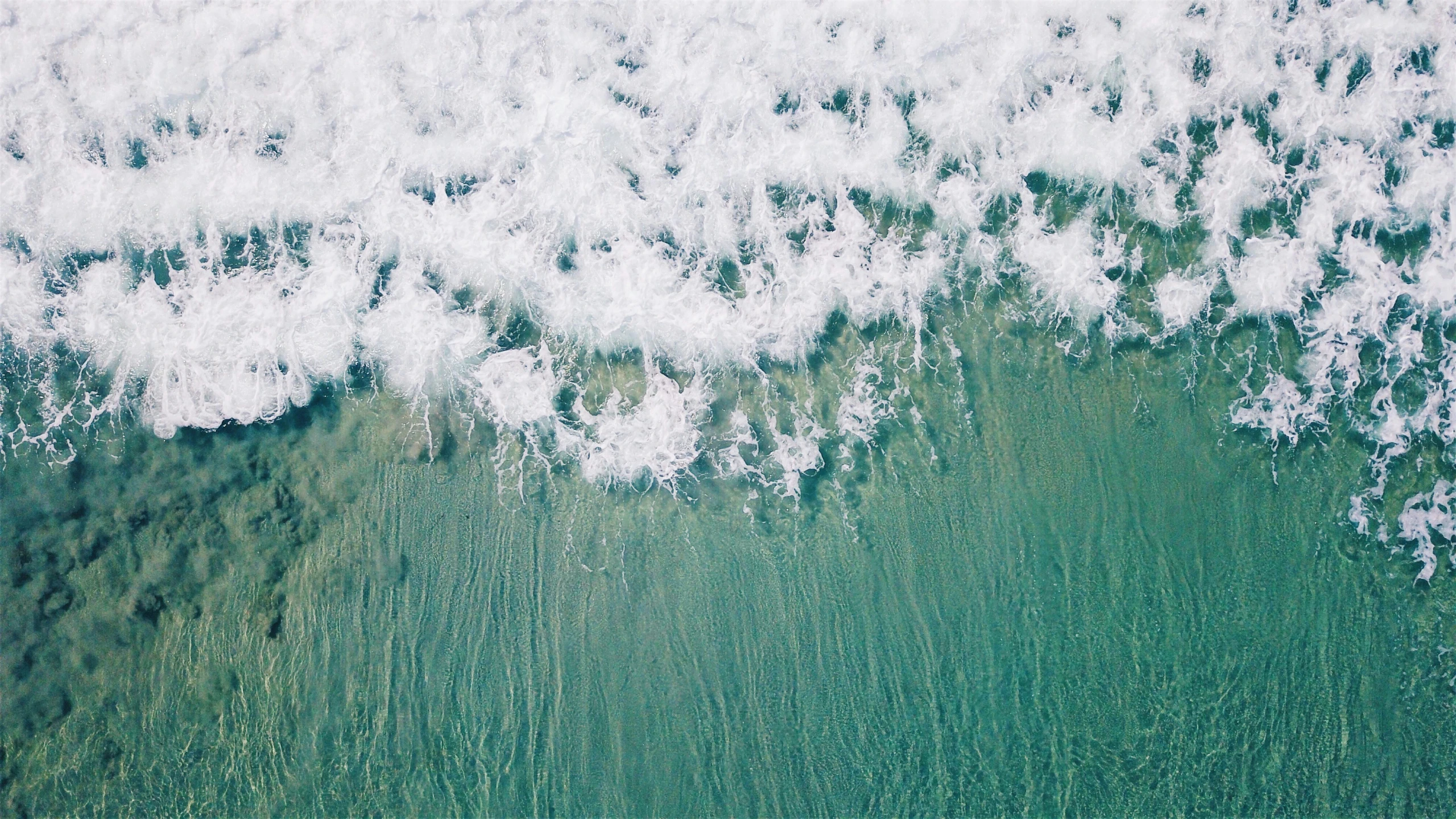 this is some water waves coming towards the shore