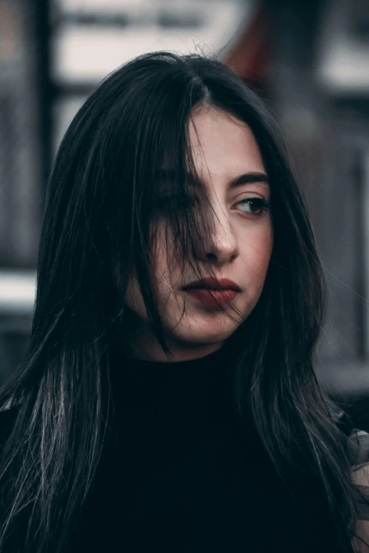 a close up of a person with long hair