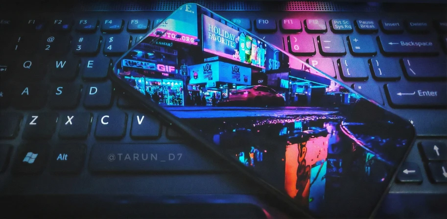 the keyboard is illuminated in multi - colored images