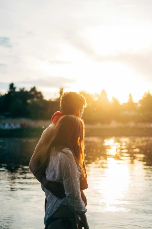 a girl and boy that are emcing each other