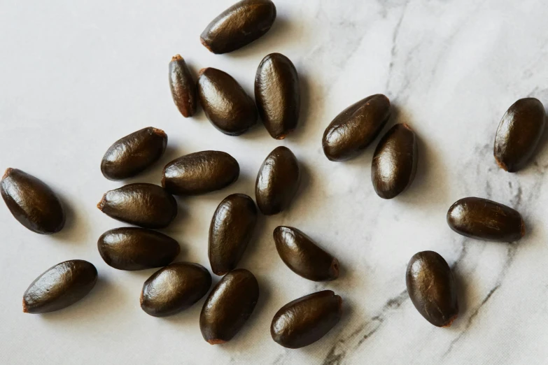 the seeds have been peeled and gathered together on the table