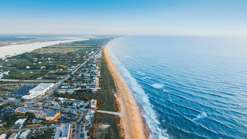 an aerial view of the beach from a helicopter