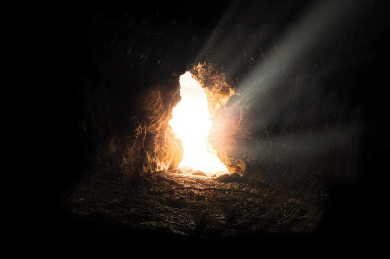 light coming through the darkness in a cave