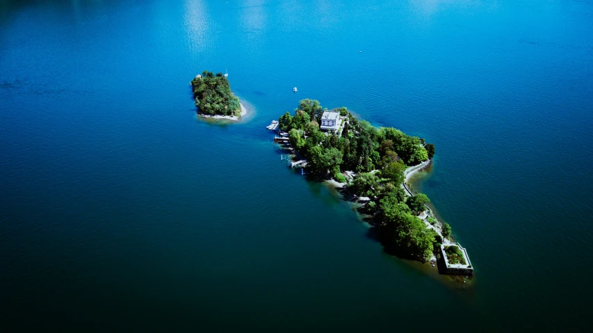 an island on top of the water is in blue
