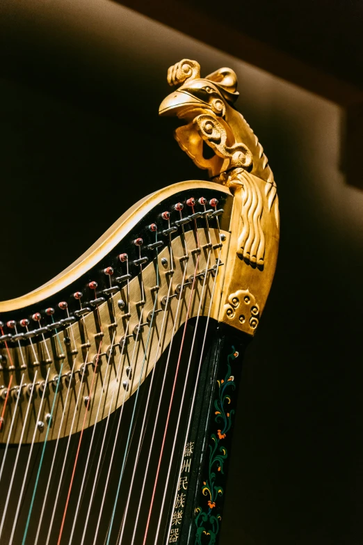 a golden harp with ornate decorations on it