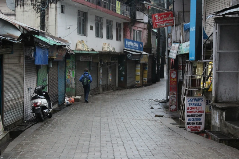 a street with a person in the middle of it