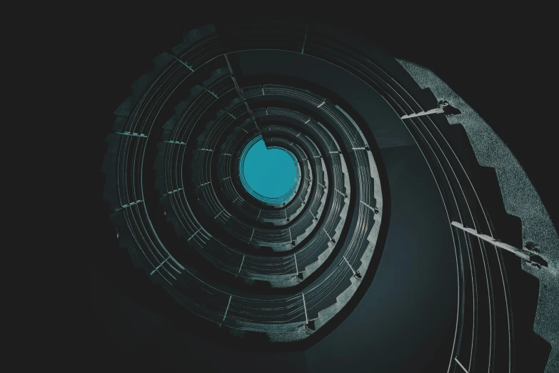 a very dark and abstract looking structure with a blue center