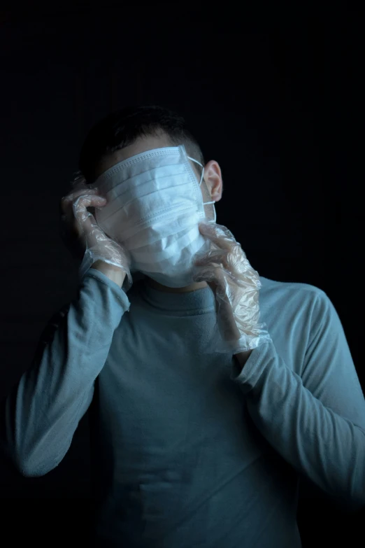 a man with a face mask covering his face