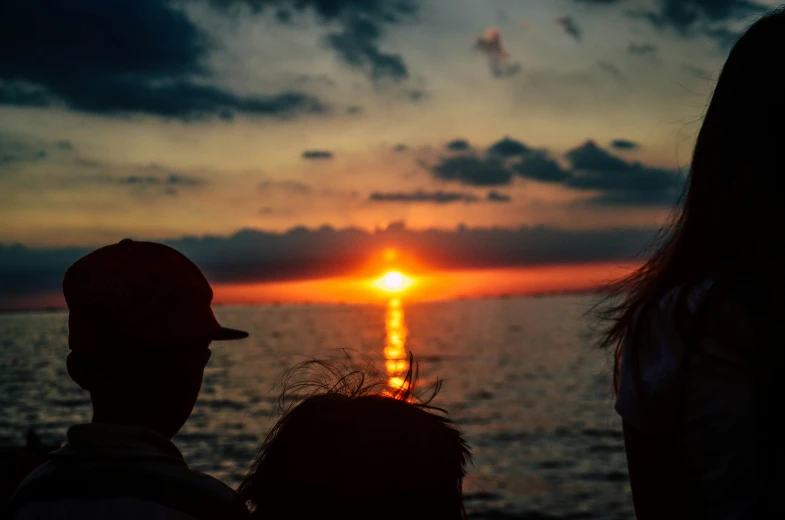 a man and woman sitting next to each other