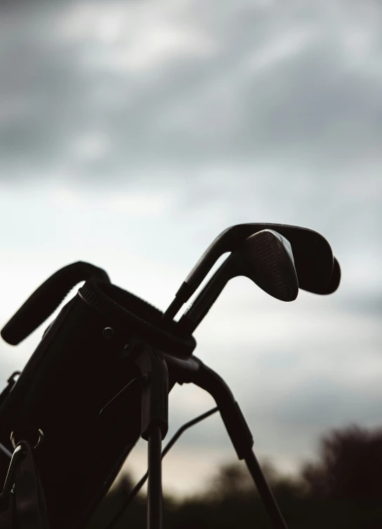 an old golf club with an interesting head rest