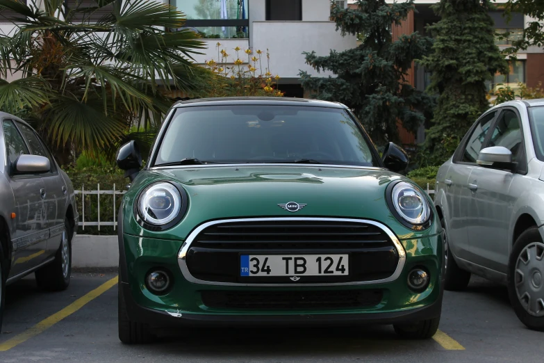 two cars parked in an individual parking space