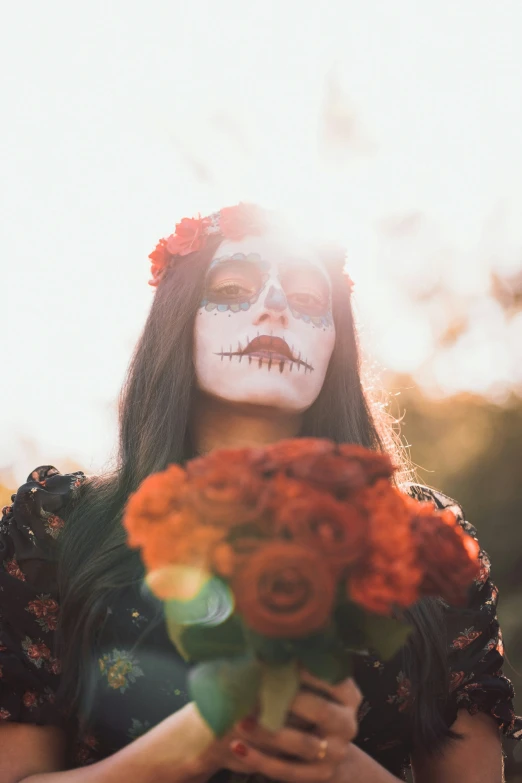 a woman is dressed up like the skeleton