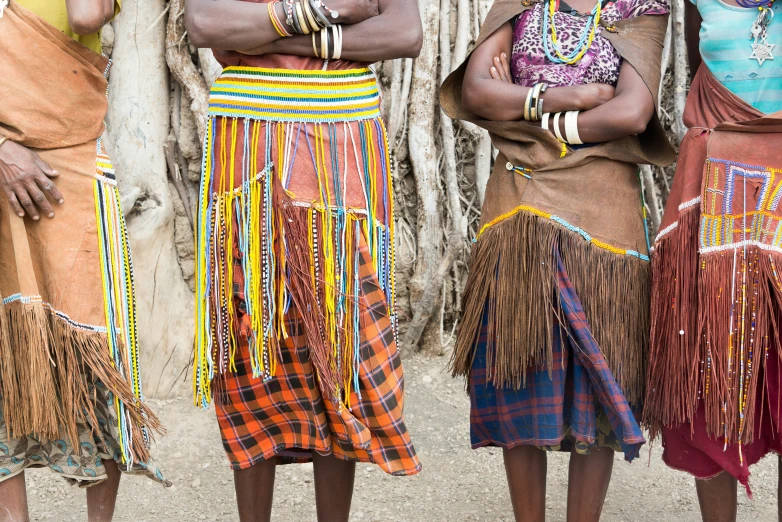 a group of young men dressed in costumes