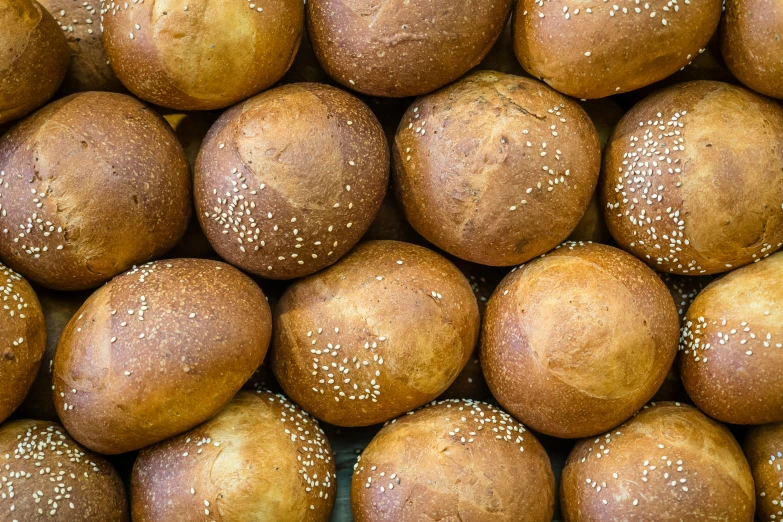 a pile of breads are stacked together