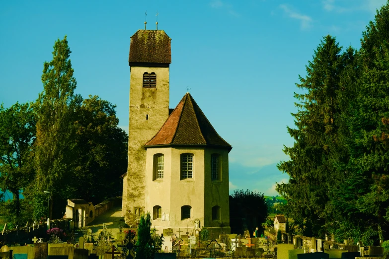 a tall white tower with a clock on top of it's face