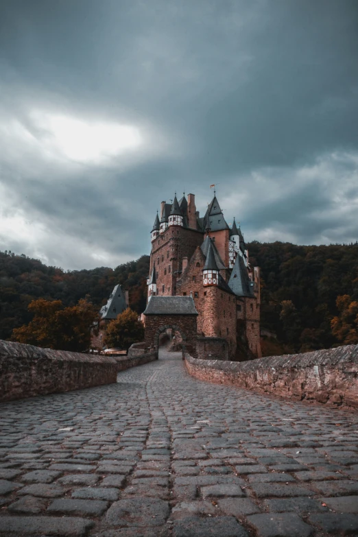 a castle that is sitting on the top of a hill