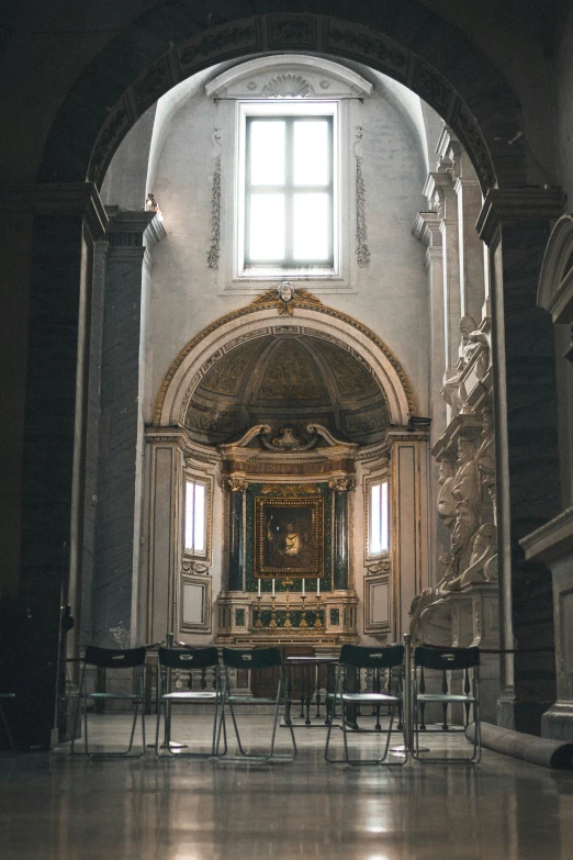 a large church with many chairs inside of it