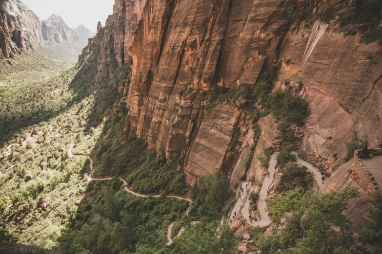 an overhead view of a beautiful mountain valley and river