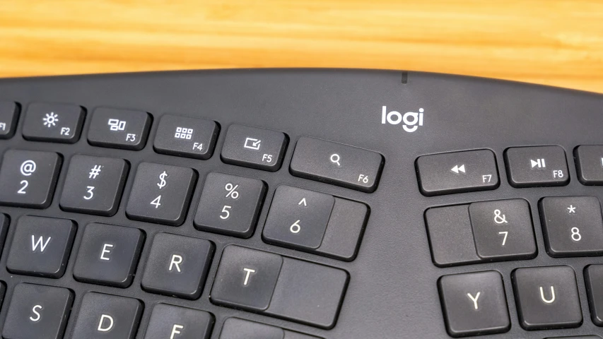 a close up of a computer keyboard with chinese characters