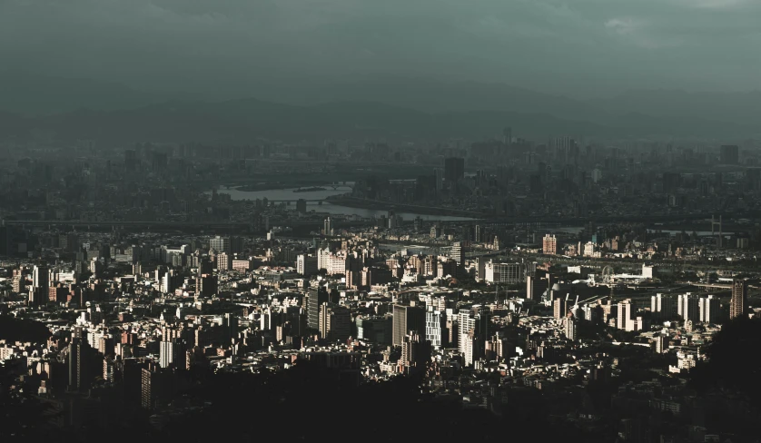 a city is seen from the top of a tall building