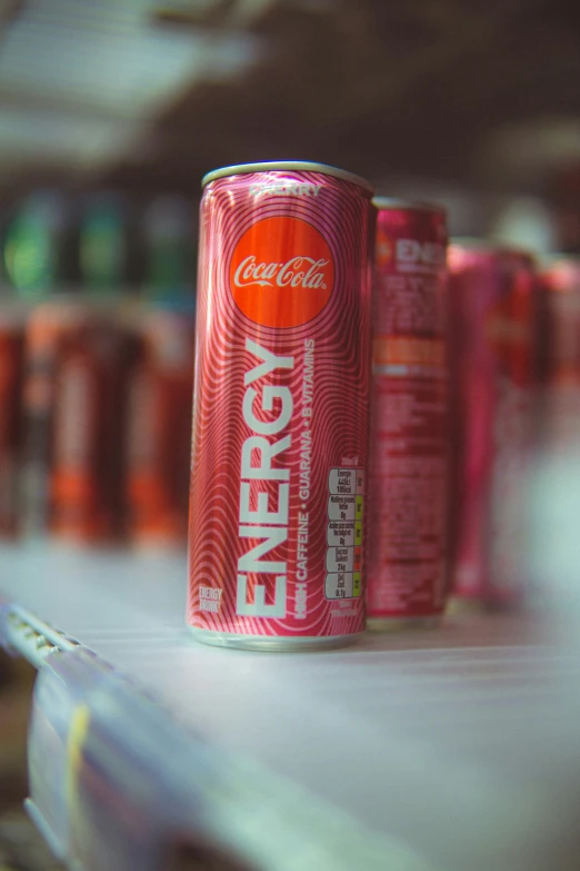 close up of cans on top of the shelf