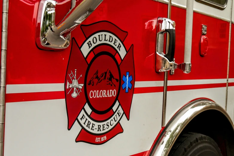 the emblem on a fire truck has mountains in it