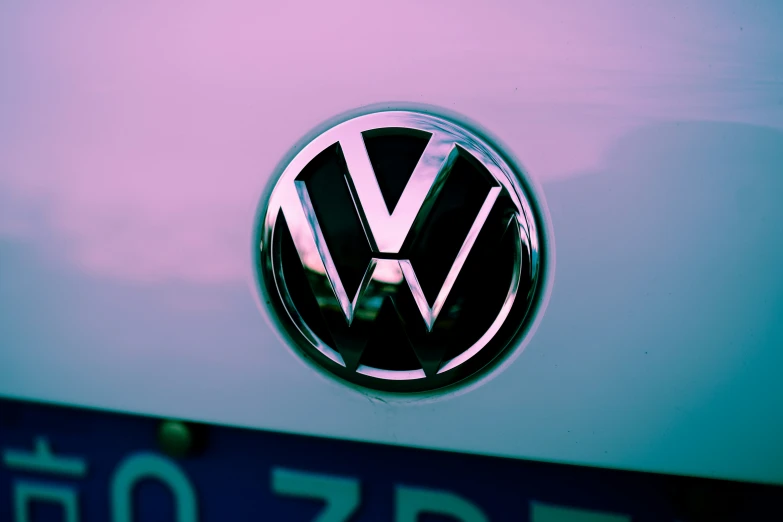 vw emblem is on the hood of a volkswagen car