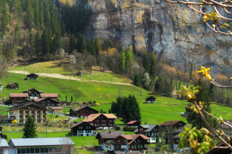 the village in the mountain is nestled on a hill