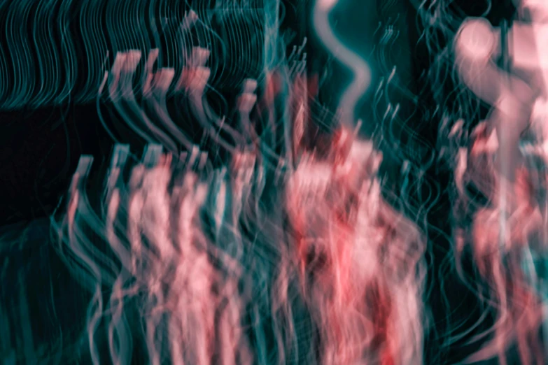 a background with red blurry lines and trees