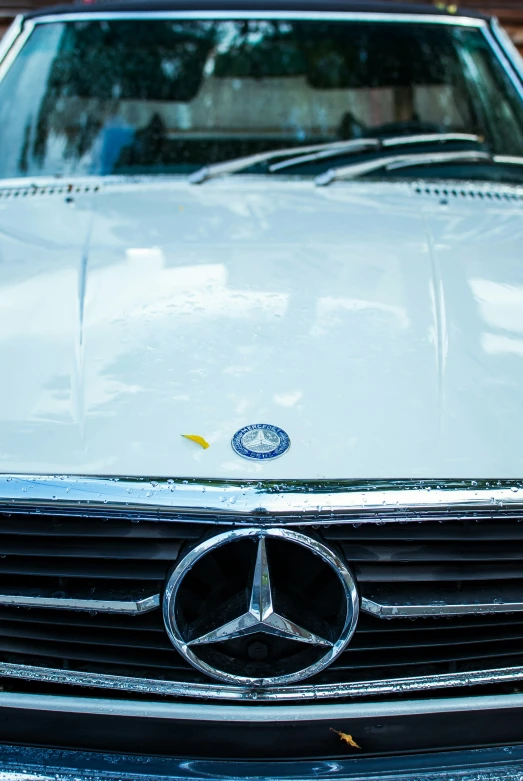 the front end of a mercedes benz coupe