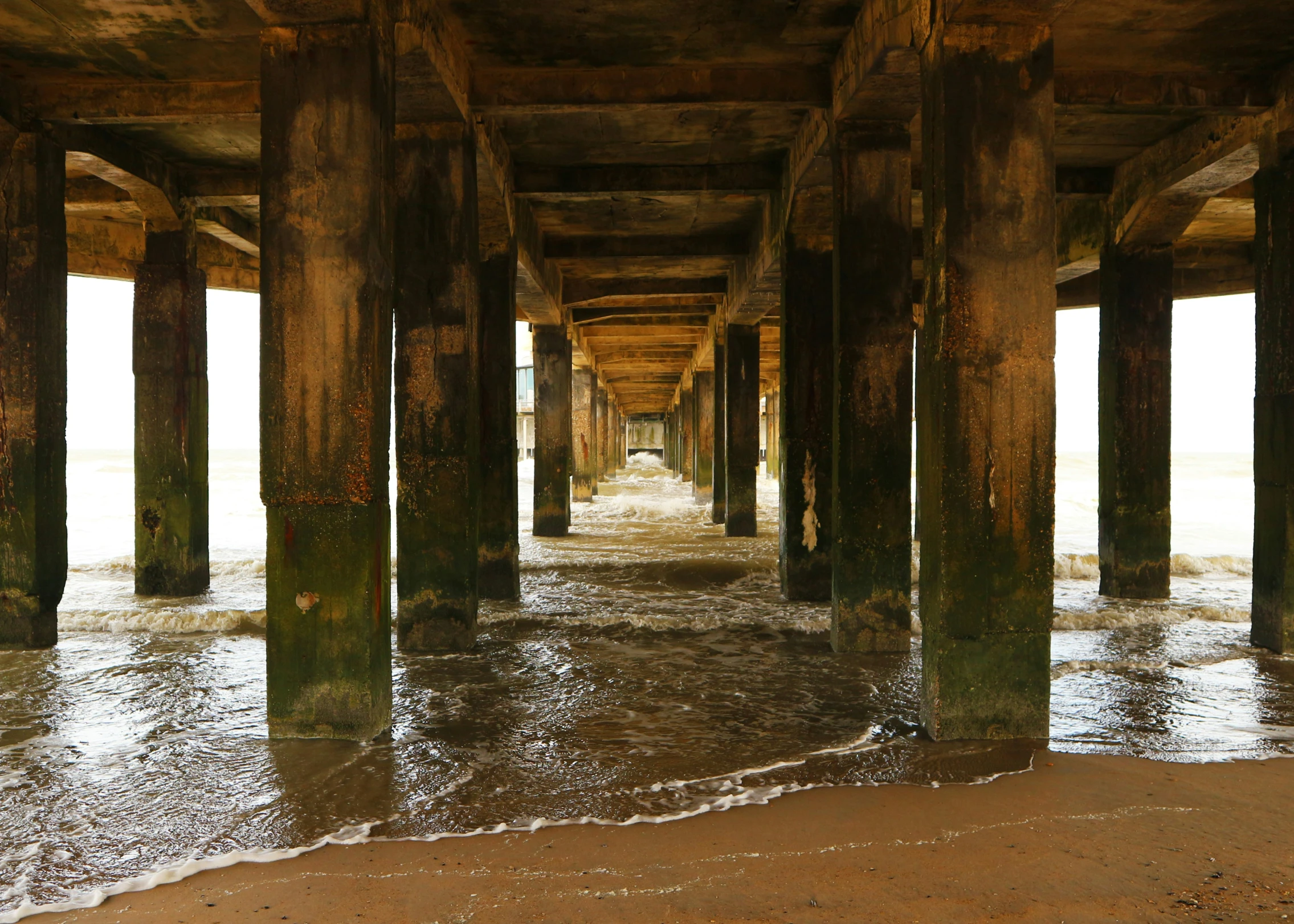 a long wooden pier stretching into the distance