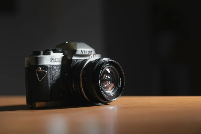 a picture of an old analog camera taken on a table