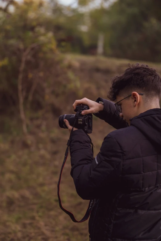 a man taking pictures with his camera