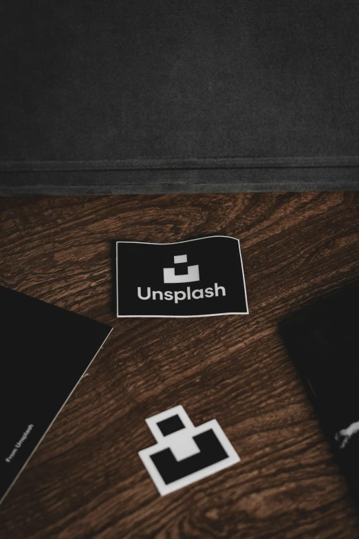 a desk with laptop and the words unsploth on it