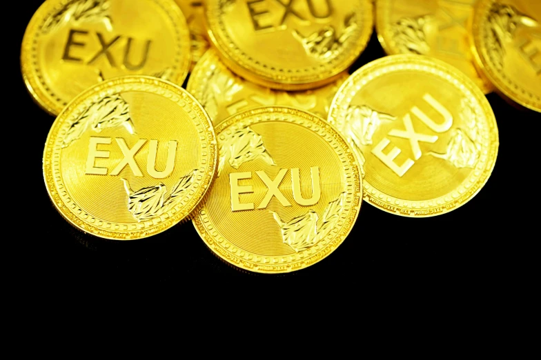 several foreign gold exex coins are shown here