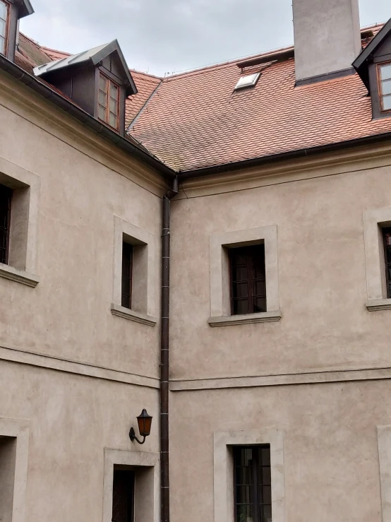 the courtyard of an old brick building