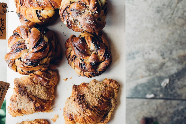 a bunch of pastries sitting next to each other