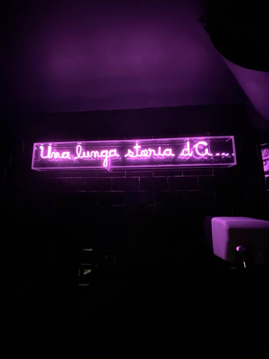 a neon sign for univen youngs stories