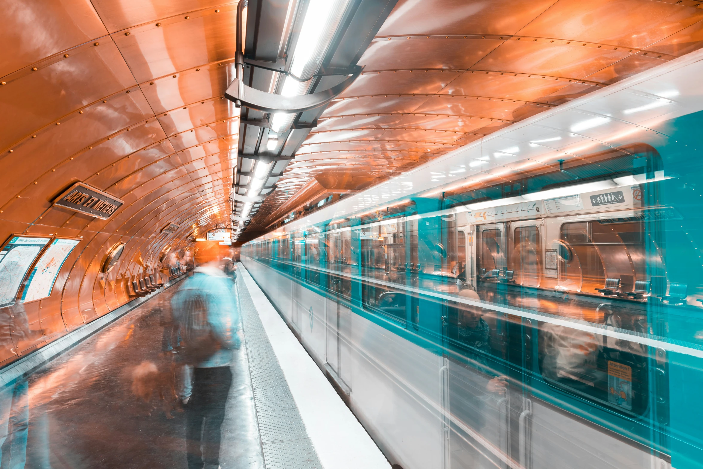 a subway train passing by in an underground tunnel