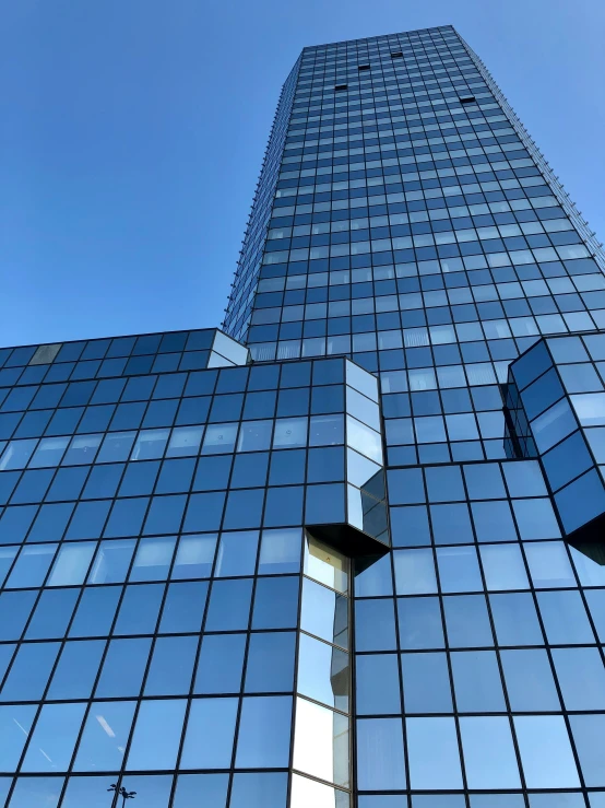 the top part of a building with very large windows