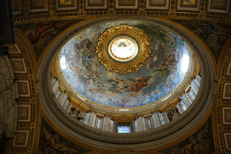 a domed cathedral with a clock on the ceiling