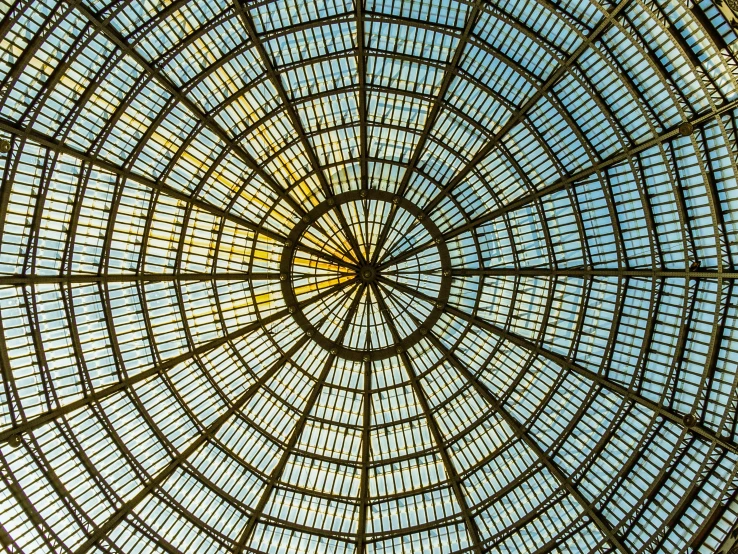 a very tall circular glass roof with many windows