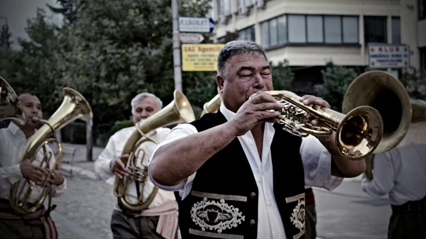 two men with different kinds of musical instruments