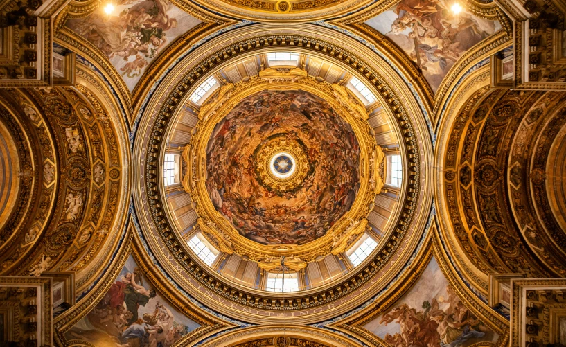 an intricately decorated church ceiling with a mosaic pattern